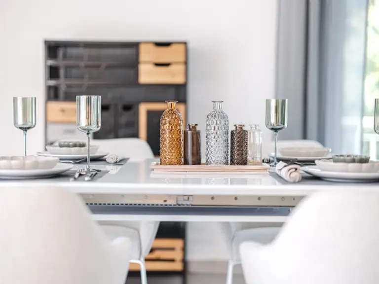 Decorative table setting in the dining area at EMERALD GROVE