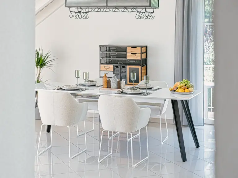 Dining area with table set for four at EMERALD GROVE